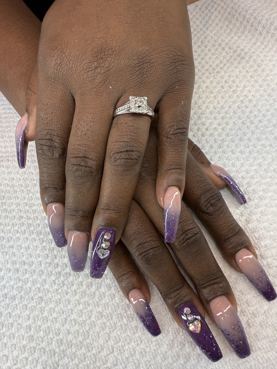 Purple glitter ombré coffin nails with rhinestone heart accents