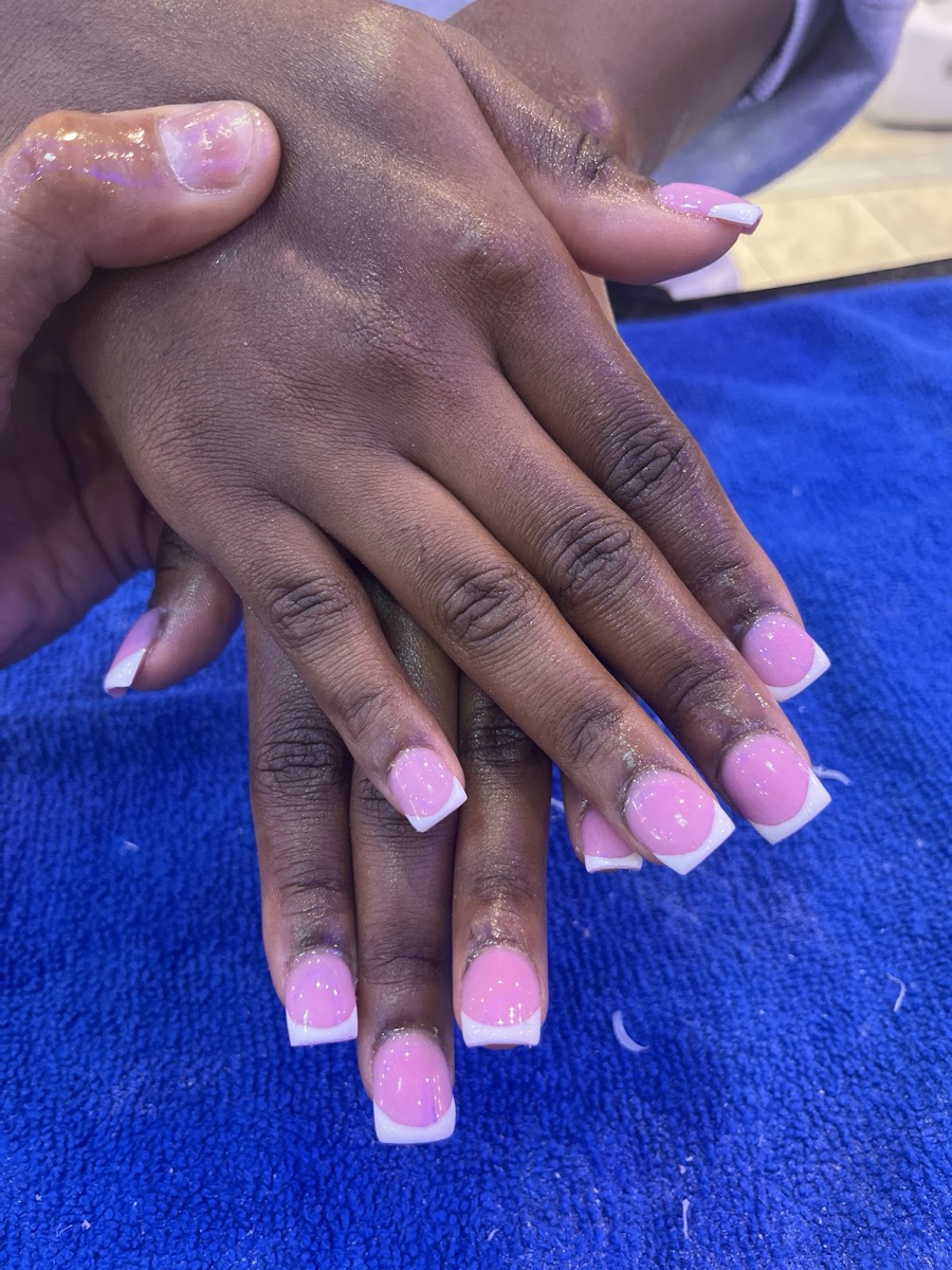 Classic pink-and-white French manicure with clean tips